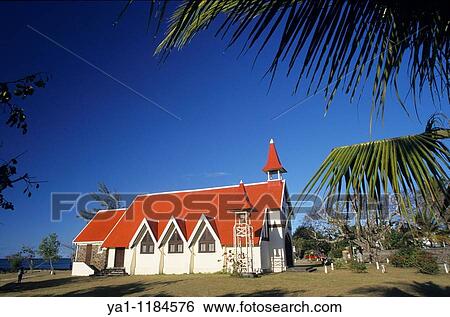Stock Photograph - Famous red-roofed chapel/church of Notre Dame de l? Auxiliatrice Cape Malheureux, Mauritius Island, Indian Ocean. Fotosearch