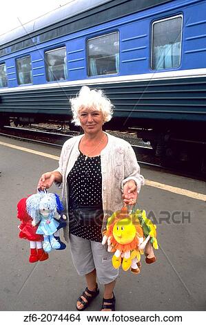 Famous Trans Siberian Railroad Older Woman Vendor Selling Toys in Kirov Russia. View Large Photo Image Picture - Famous Trans Siberian Railroad Older Woman Vendor Selling Toys in Kirov Russia.. Fotosearch