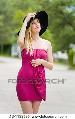 Fanciful with a hat young woman View Large Photo Image Stock Photography - Fanciful with a hat young woman. Fotosearch