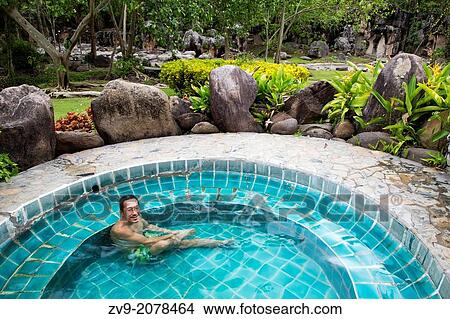Fang Hot Springs are situated at Ban Pin, Fang in Chiang Mai province. The hot springs originate from simmering granite with temperatures from 90 to 100 degrees Celsius. View Large Photo Image Picture - Fang Hot Springs are situated at Ban Pin, Fang in Chiang Mai province. The hot springs originate from simmering granite with temperatures from 90 to 100 degrees Celsius.. Fotosearch