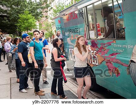 Fans of the Netflix series??Orange is the New Black?? line up at a rebranded food truck in Soho in New York for free??Crazy Pyes?? and chocolate and vanilla swirl soft ice cream. View Large Photo Image Stock Photograph - Fans of the Netflix series??Orange is the New Black?? line up at a rebranded food truck in Soho in New York for free??Crazy Pyes?? and chocolate and vanilla swirl soft ice cream.. Fotosearch