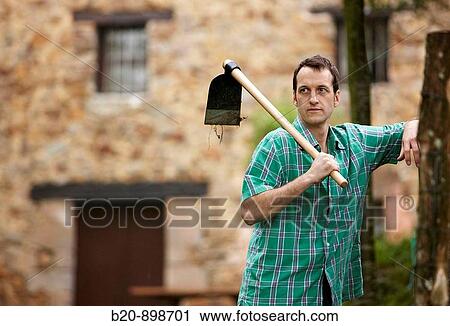 Farmer with hoe, hand tool,? caserio?, Guipuzcoa, Basque Country, Spain View Large Photo Image Stock Image - Farmer with hoe, hand tool,? caserio?, Guipuzcoa, Basque Country, Spain. Fotosearch