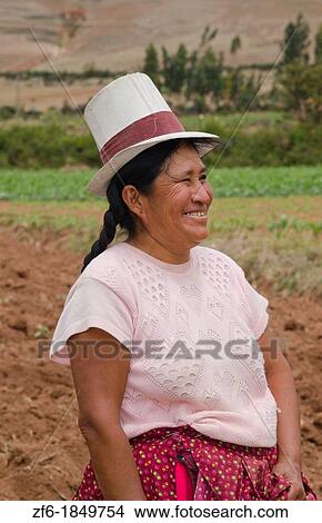 Farming portrait of woman smiling on farm in small town of Chinchero Peru South America View Large Photo Image Picture - Farming portrait of woman smiling on farm in small town of Chinchero Peru South America. Fotosearch