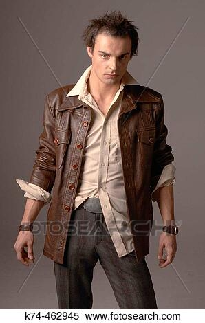 fashion image of young man in leather jacket View Large Photo Image Stock Photography - fashion image of young man in leather jacket. Fotosearch