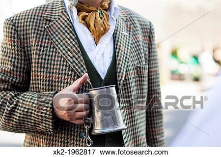 Fashion man holding an old beer mug, Deptford Jack, London, UK View Large Photo Image Stock Photo - Fashion man holding an old beer mug, Deptford Jack, London, UK. Fotosearch