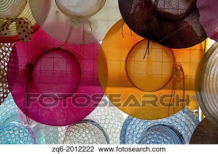 Fashionable Hats on a Street Market in the Port of Puerto Galera on Mindoro Island, Philippines. View Large Photo Image Stock Image - Fashionable Hats on a Street Market in the Port of Puerto Galera on Mindoro Island, Philippines.. Fotosearch