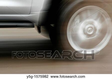 fast car driving on street surface View Large Photo Image Stock Image - fast car driving on street surface. Fotosearch