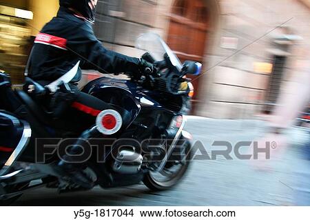 fast carabiniere motorbike rider in rome italy View Large Photo Image Picture - fast carabiniere motorbike rider in rome italy. Fotosearch