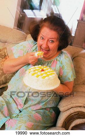 Fat woman eating cake View Large Photo Image Stock Image - Fat woman eating cake. Fotosearch