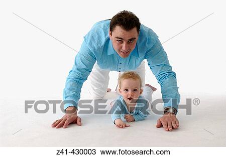 Father and baby crawling together View Large Photo Image Stock Image - Father and baby crawling together. Fotosearch