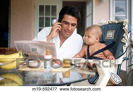 father and baby having breakfast View Large Photo Image Stock Photo - father and baby having breakfast. Fotosearch