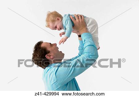Father and baby View Large Photo Image Picture - Father and baby. Fotosearch