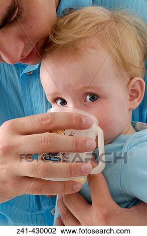 Father and baby View Large Photo Image Stock Image - Father and baby. Fotosearch