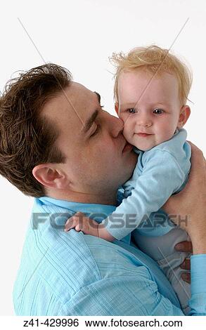 Stock Photograph - Father and baby. Fotosearch