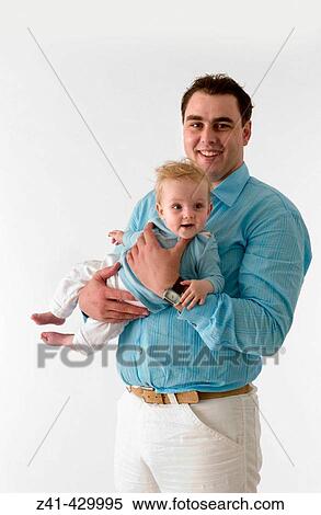 Stock Photography - Father and baby. Fotosearch