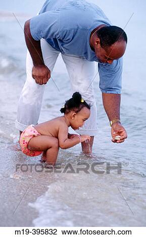 father and daughter at the beach View Large Photo Image Stock Image - father and daughter at the beach. Fotosearch