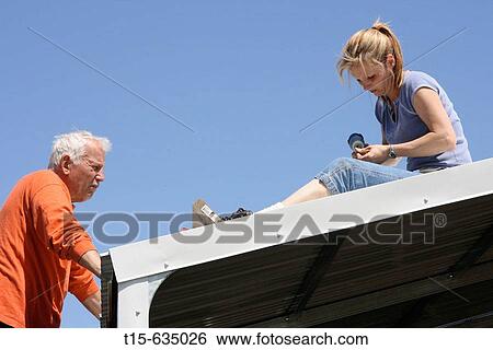 Father and daughter building a shed View Large Photo Image Stock Photograph - Father and daughter building a shed. Fotosearch