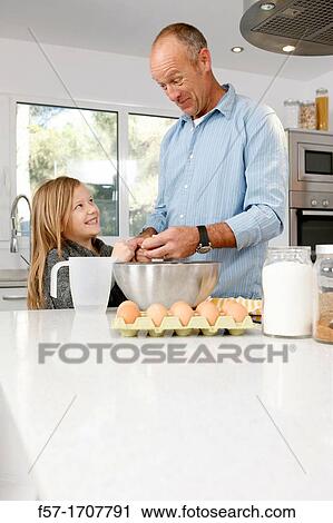 Father and daughter in the kitchen View Large Photo Image Stock Image - Father and daughter in the kitchen. Fotosearch
