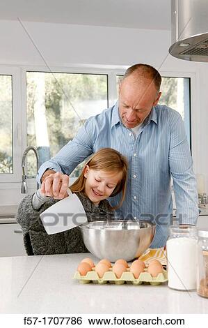 Father and daughter in the kitchen View Large Photo Image Stock Photograph - Father and daughter in the kitchen. Fotosearch