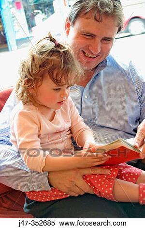 Father and daughter reading View Large Photo Image Stock Photography - Father and daughter reading. Fotosearch