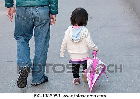 Stock Image - Father and daughter.. Fotosearch