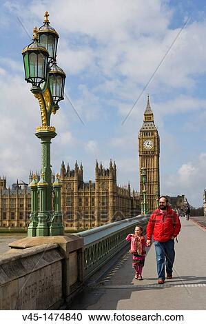 Father and daughter walking over Westminster Bridge with the Big Ben, the Clock Tower of the Palace of Westminster at the background, City of Westminster, London, England, UK View Large Photo Image Stock Image - Father and daughter walking over Westminster Bridge with the Big Ben, the Clock Tower of the Palace of Westminster at the background, City of Westminster, London, England, UK. Fotosearch
