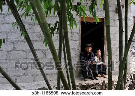 Stock Photo - father and his son, hamlet around Sa Phin, Dong Van plateau, Ha Giang province, northern Vietnam, southeast asia. Fotosearch