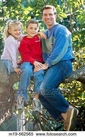 Stock Photography - father and kids in a tree. Fotosearch
