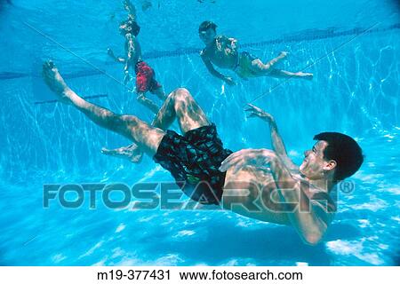father and kids underwater View Large Photo Image Stock Image - father and kids underwater. Fotosearch