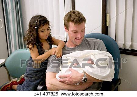 Father and little sister with newborn baby View Large Photo Image Stock Photography - Father and little sister with newborn baby. Fotosearch