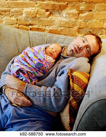 Father and newborn baby View Large Photo Image Stock Image - Father and newborn baby. Fotosearch