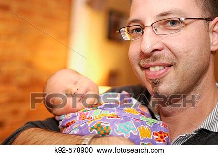 Father and one-week-old infant View Large Photo Image Stock Image - Father and one-week-old infant. Fotosearch
