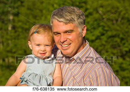 Father and one year old daughter View Large Photo Image Stock Photography - Father and one year old daughter. Fotosearch