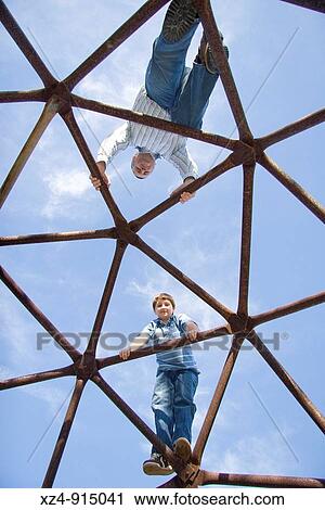 father and son climb geodome View Large Photo Image Stock Image - father and son climb geodome. Fotosearch