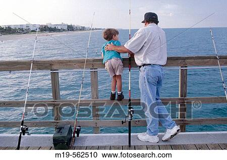 father and son fishing View Large Photo Image Stock Image - father and son fishing. Fotosearch