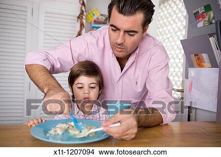 Father and son. View Large Photo Image Picture - Father and son.. Fotosearch