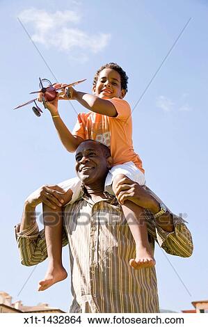 Father and son. View Large Photo Image Picture - Father and son.. Fotosearch