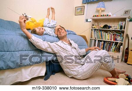 Father and son playing View Large Photo Image Stock Image - Father and son playing. Fotosearch