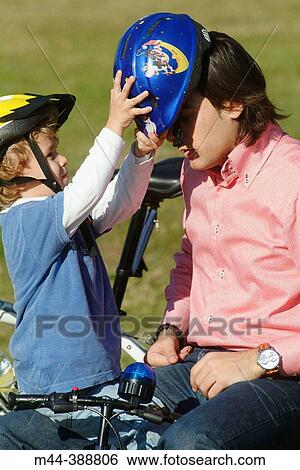 Stock Photograph - Father and son playing. Fotosearch
