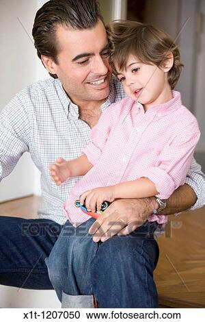 Father and son. View Large Photo Image Stock Image - Father and son.. Fotosearch