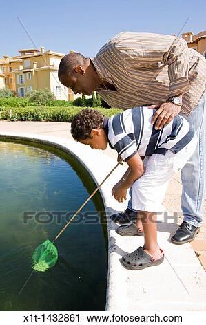 Father and son. View Large Photo Image Stock Image - Father and son.. Fotosearch