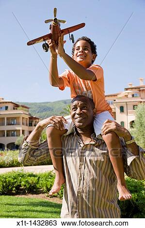 Father and son. View Large Photo Image Stock Image - Father and son.. Fotosearch