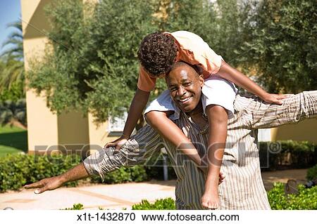 Father and son. View Large Photo Image Stock Image - Father and son.. Fotosearch
