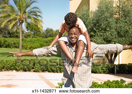 Father and son. View Large Photo Image Stock Image - Father and son.. Fotosearch