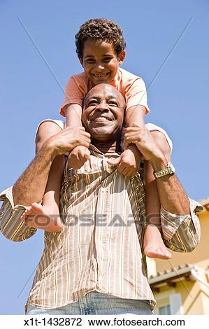 Father and son. View Large Photo Image Stock Image - Father and son.. Fotosearch