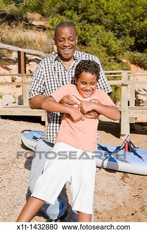 Father and son. View Large Photo Image Stock Image - Father and son.. Fotosearch
