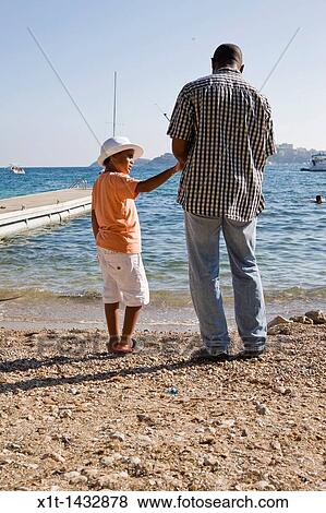 Father and son. View Large Photo Image Stock Photo - Father and son.. Fotosearch
