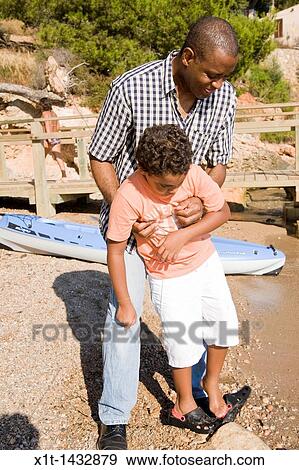 Stock Photo - Father and son.. Fotosearch
