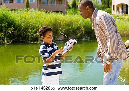 Father and son. View Large Photo Image Stock Photography - Father and son.. Fotosearch