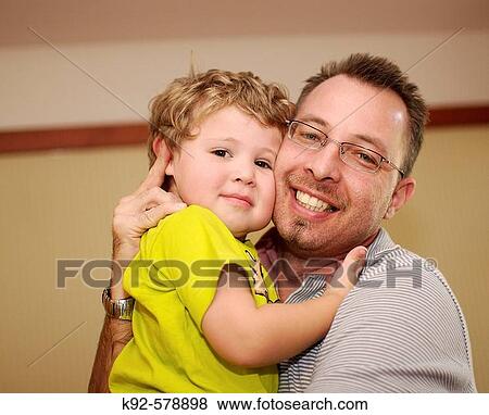 Father and three-year-old son View Large Photo Image Stock Photo - Father and three-year-old son. Fotosearch